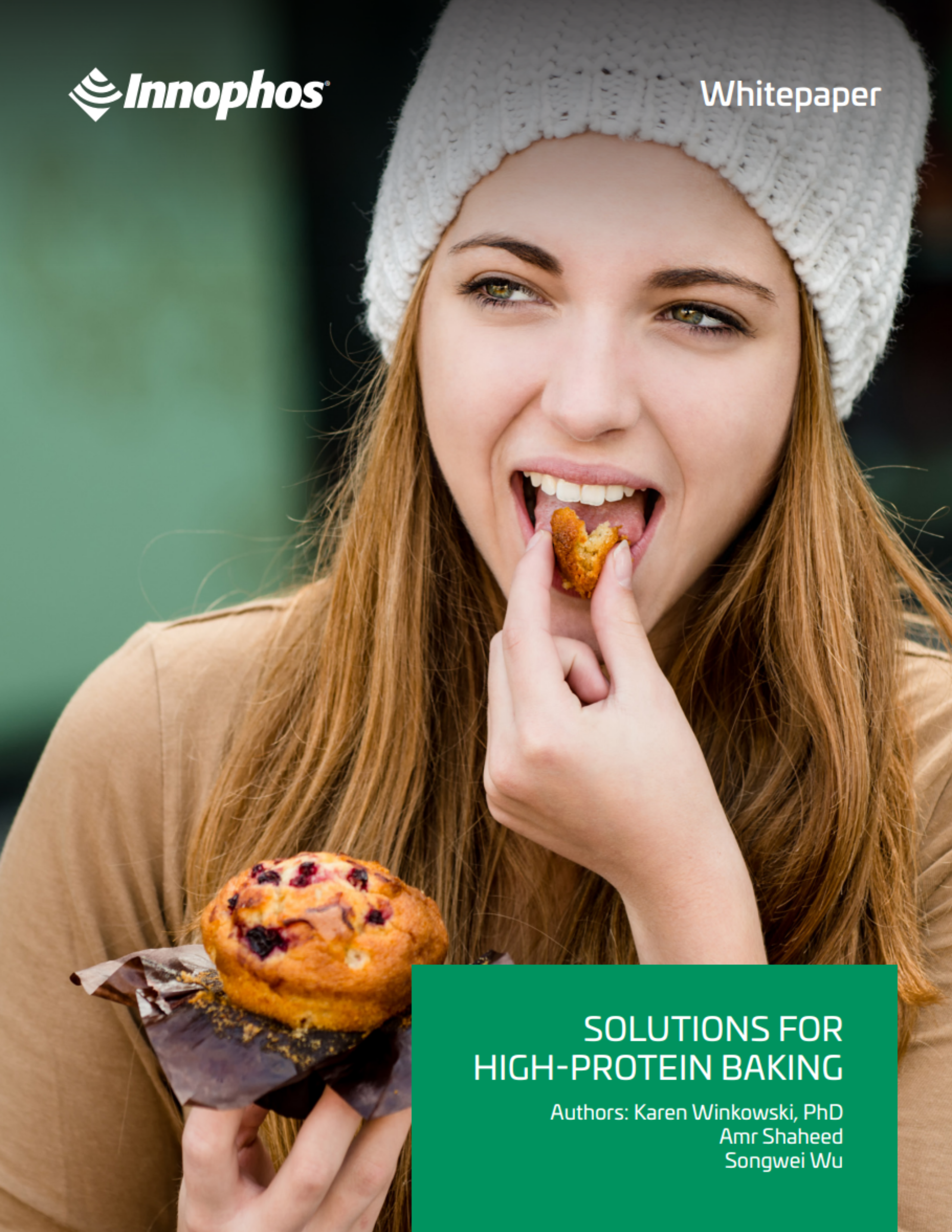 A woman biting from a piece of muffin