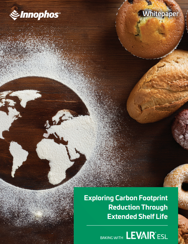 Bread and Earth-shaped flour on a wood surface