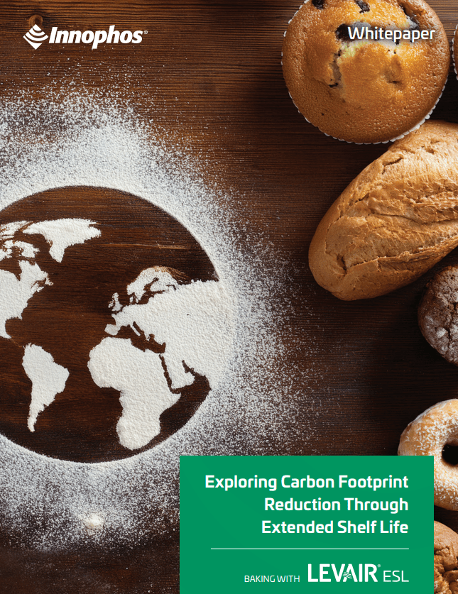 Bread and Earth-shaped flour on a wood surface