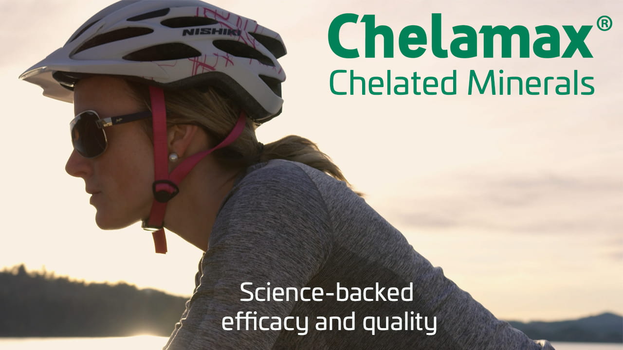 Person cycling outdoors with a lake and mountains in the background, featuring Chelamax® text.