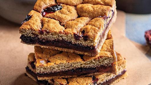 Dense protein bars stacked on a surface