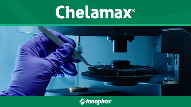 Gloved hand using lab device labeled “Chelamax”