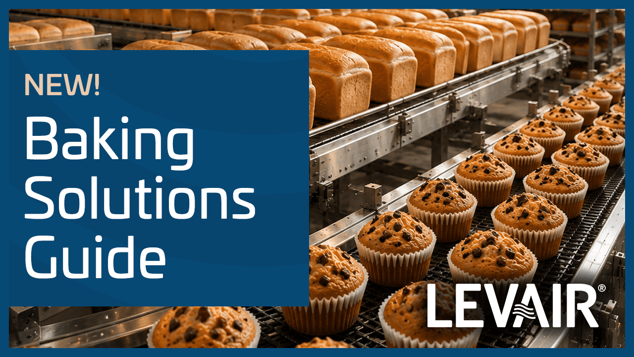 Baking Solutions Guide cover with bread and muffins on a conveyor belt.