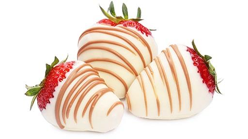 white chocolate-dipped strawberries with milk chocolate drizzle