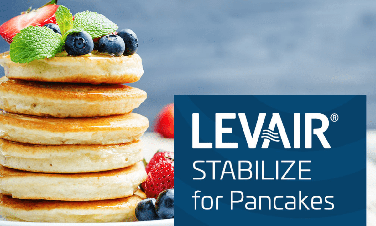 Stack of pancakes with berries and mint next to text 'LEVAIR® STABILIZE for Pancakes'