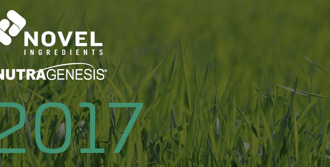 A graphic backdropped by a field of grass