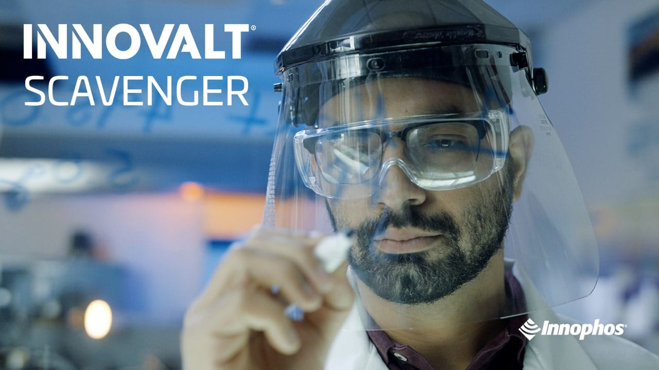 Person wearing a face shield holding an object, with text reading INNOVALT SCAVENGER and Innophos logo