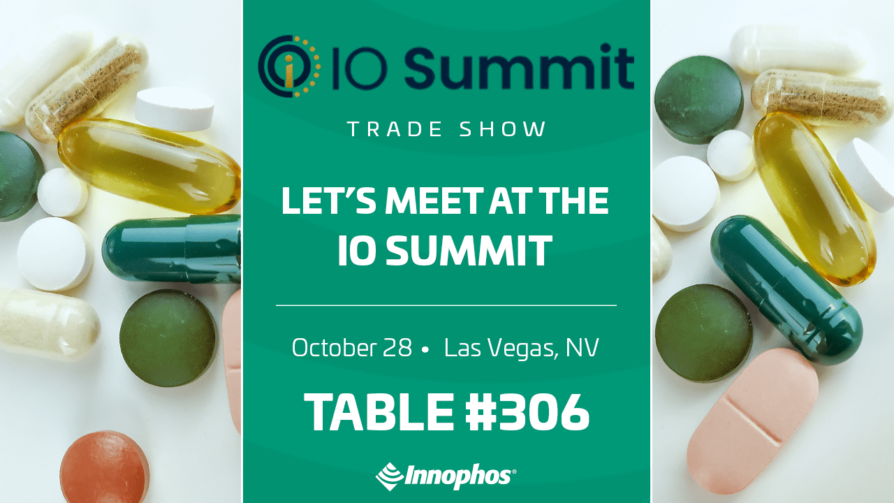 IO Summit Trade Show ad for Innophos at Table #306 on October 28 in Las Vegas, with pills and capsules in the background.