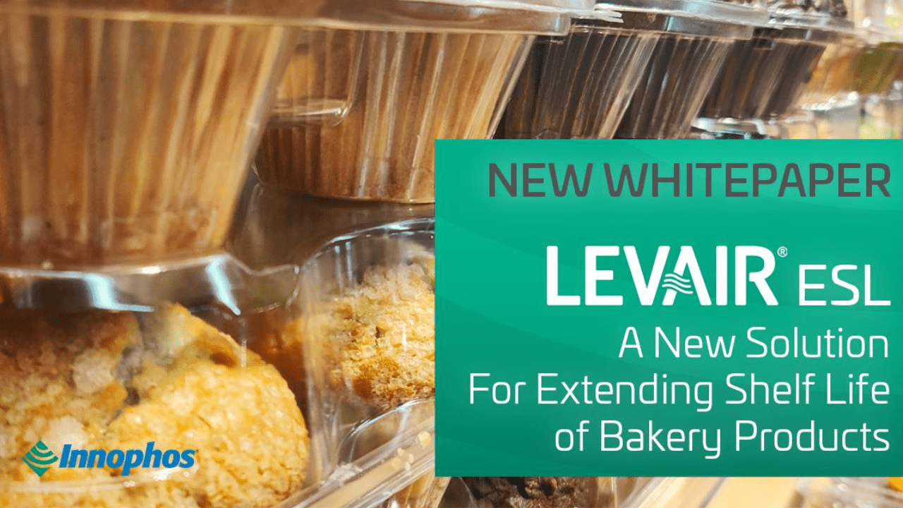 Packaged muffins with a green banner promoting a LEVAIR® ESL whitepaper on extending bakery shelf life