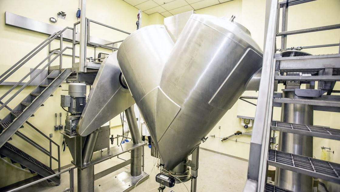 Photo of an industrial mixer located inside of an Innophos manufacturing facility.